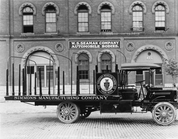 A 1915 Packard Truck owned by the Simmons Manufacturing Company.  The body was produced by the W.S. Seaman Company.