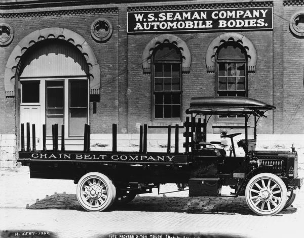 A Packard 2-ton truck owned by the Chain Belt Company.  Its body was produced by the W.S. Seaman Company.