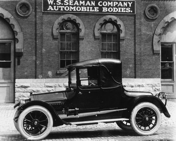 A 1915 Cadillac with Jonas top, the body of which was constructed by the W.S. Seaman Company.