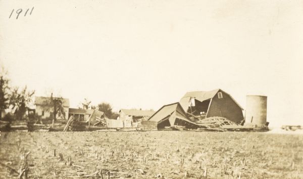 A ruined barn and farm destroyed by a tornado that hit Oregon, Wisconsin.