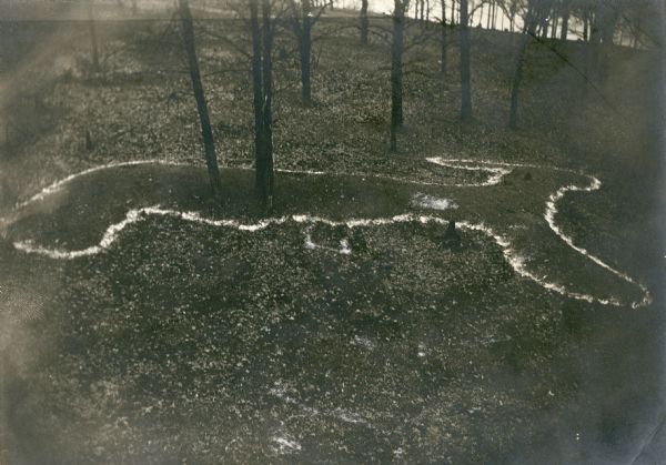 Deer or rabbit effigy mound outlined with lime (ca. 800-1100 A.D.), at the McConnell mound group.