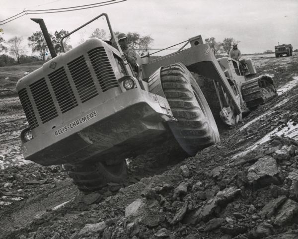 Construction of Interstate Highway I-94 in Waukesha County using an earthmover manufactured by Allis Chalmers.