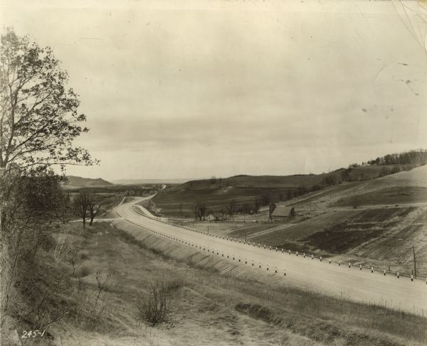 Roadimprovements along the portion of US Highway 16 known as the La Crosse-West Salem Road.  At the time, this road represented the ultimate in modern highway construction. The grading was completed in 1935 by William Lathers and the paving was done by J.D. Bonness, Inc., of Milwaukee.