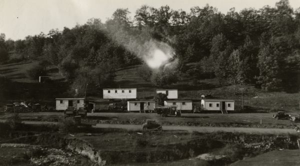 Cabins for employees of the Interstate Construction Company working near Richland Center and Boaz. Road construction sites were frequently far from accommodations where the workers might stay.  In such cases the companies built cabins or purchased trailers for their employees.