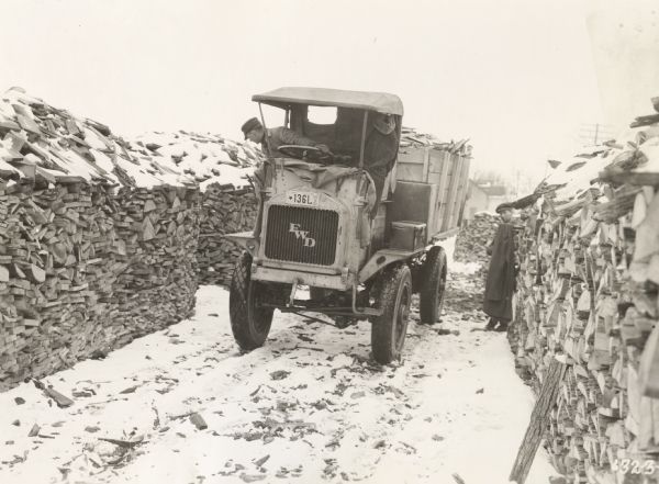 Truck owned by the Holt Lumber Company of Oconto which was used by the company to deliver slab wood to customers in the city.  The truck was manufactured by the Four Wheel Drive Company of Clintonville.