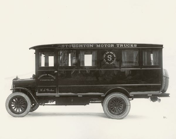 Closed truck manufactured by the Stoughton Wagon Company.  This company's beginning as a manufacturer of wagons was a common origin for automobile manufacturers.