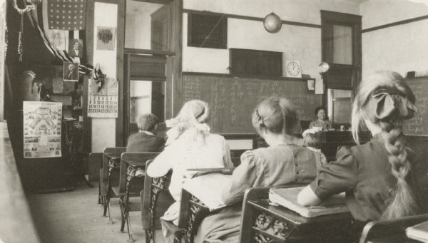 Unidentified one-room school in Racine County. Transportation to better consolidated schools was one significant improvement that motorized vehicles brought about in the lives of rural farm families.