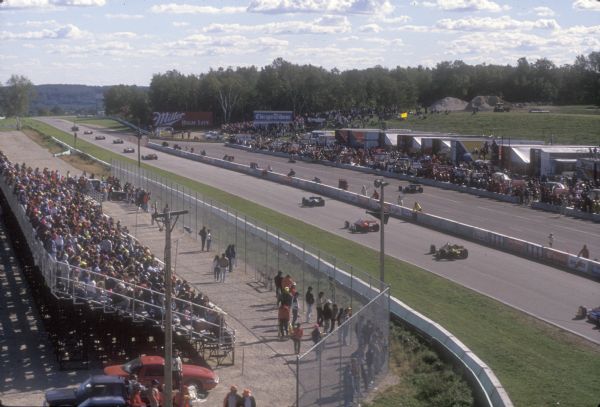 Race course and grandstand at Road America in Elkhart Lake, where racing began in 1955. Prior to that, Elkhart Lake was host to automobile racing on the village streets.