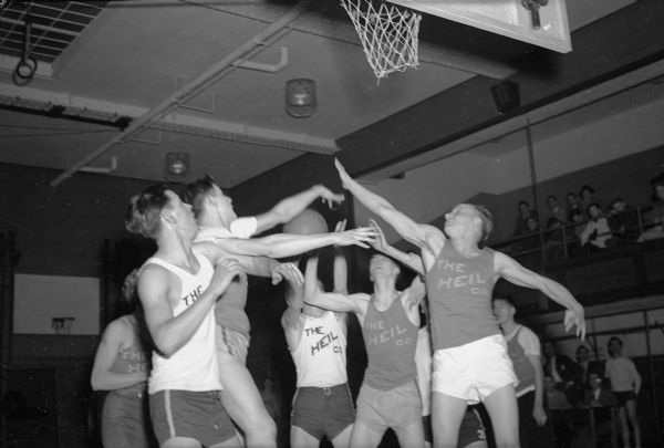 Basketball game between the electrical shop and machine shop employees of the Heil Company in Milwaukee.