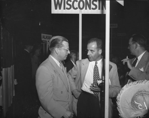 Carl Thompson, Stoughton, national committeeman, and Gaylord Nelson, then a state senator and the chair of the Wisconsin delegation, conferring on the floor at the Democratic National Convention Hall in Chicago, Illinois.