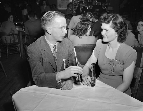 Francis Beecher and Dorothy Rawlings indulge in a drink and conversation celebrating the 1st Anniversary of the Community Center's Young Adult Club.