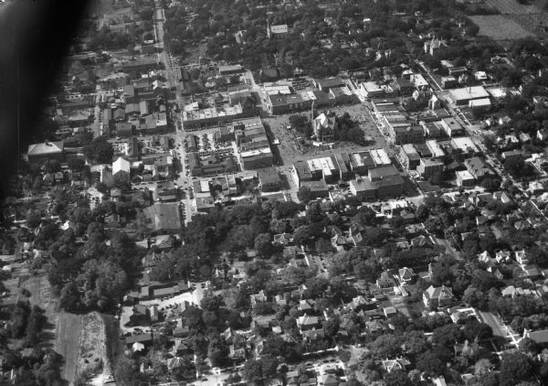 Aerial view of the town including the County Courthouse and the surrounding buildings.