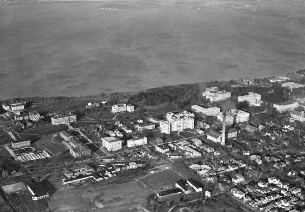 Aerial view of a portion of the University of Wisconsin-Madison campus and the shoreline of Lake Mendota.