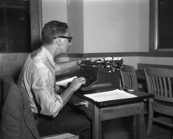 Richard Jefferson completing his PhD thesis on a rented typewriter in the Memorial Library, University of Wisconsin.