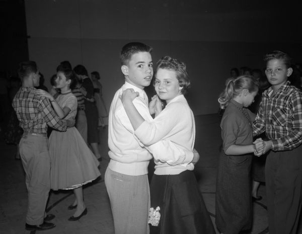 Student couples dancing at the Cherokee Heights School dance.  Included in the foreground are Sue Wehrle and Robert Geppert.