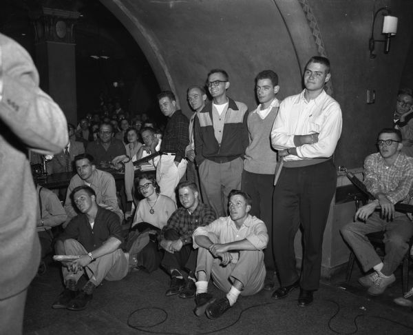University of Wisconsin students in the Rathskeller during a presentation by the cartoonist Walt Kelly.