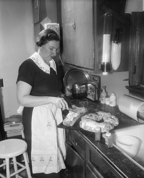 Rosamond Doran Frosting Christmas Bread | Photograph | Wisconsin ...