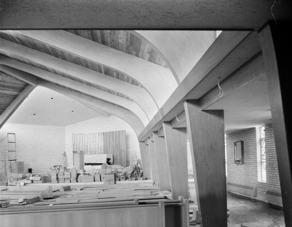 Interior of sanctuary of Our Lady Queen of Peace Catholic Church, 401 South Owen Drive, during construction.