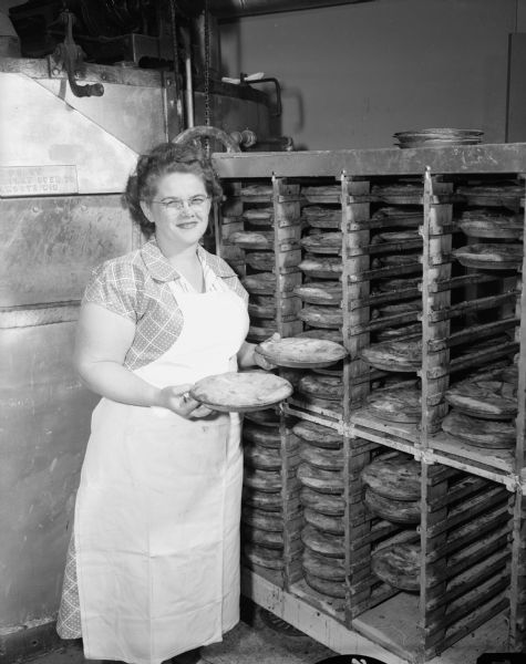 Edith Murray holds a pie she baked at Bjelde Pie Shop, 302 North Frances Street. She is treasurer for Sweet Adelines of Madison.