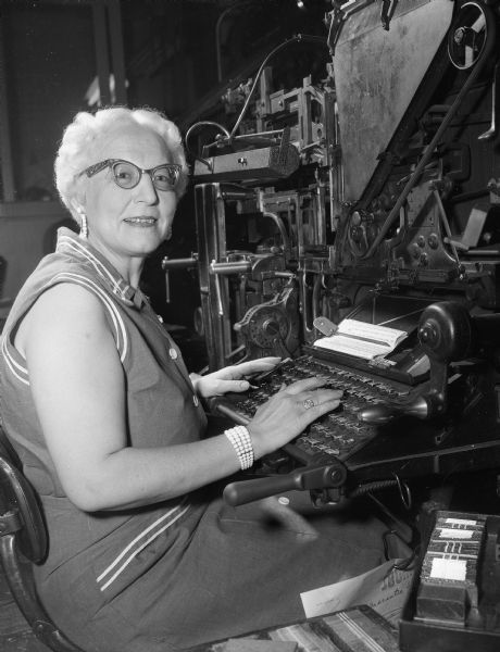 Ethel Anderson at the linotype machine in the composing room of Madison Newspapers Incorporated.
