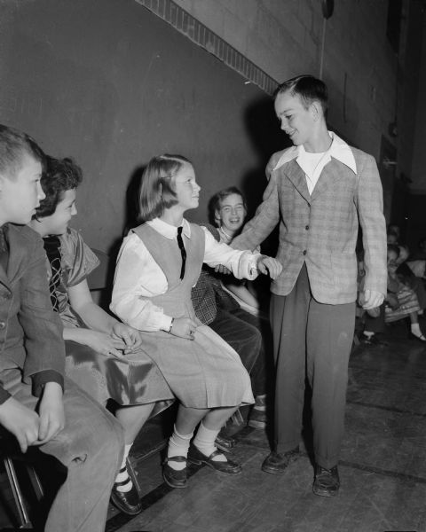 John Curtis asks Patty Parsons to dance with him at a Shorewood School dancing class.