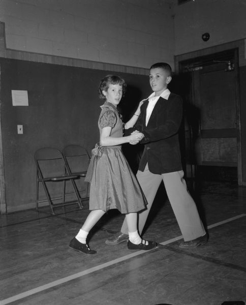 Kathy Maloney and Bobby Brown trying out dance steps at a Shorewood School dance class.