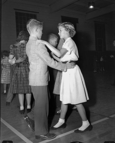 Couples on the dance floor at a Shorewood School dancing class.