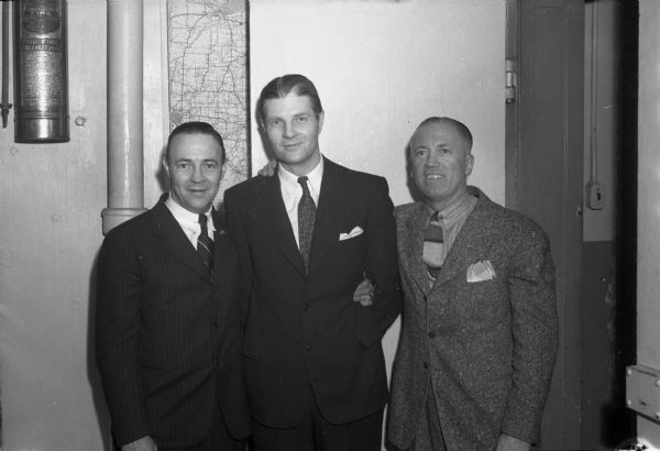 Arthur M. Joys, his brother Robert (left), and attorney Darrell MacIntyre (right), at the end of Arthur's trial that resulted in a not-guilty verdict by reason of insanity. Arthur Joys was accused of assaulting his daughter Joan with a hammer and butcher knife.