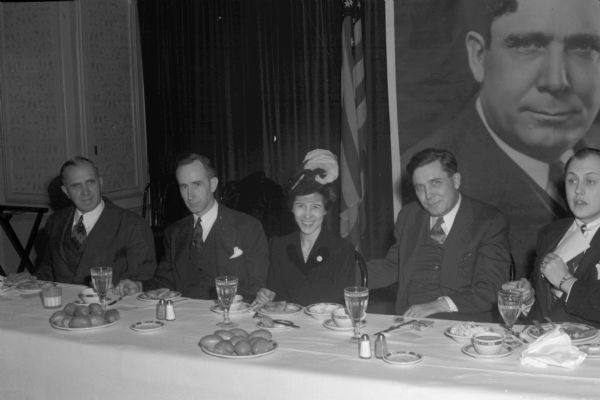 Wendell Willkie dining with campaign workers in Milwaukee in 1944.  Left to right: William J.P. Aberg, Madison; Assemblyman Vernon Thomson (R-Richland Center); Mary Byard Davis, Madison, assistant chair of Wisconsin Willkie for president committee; and Wendell Willkie.
