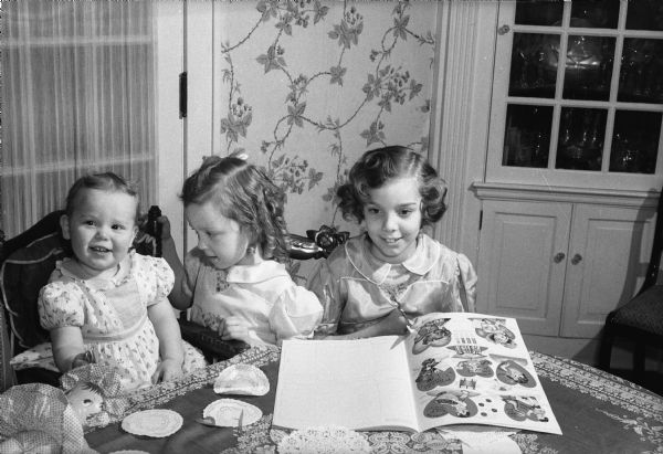Crownhart children, Virginia, Sally, and Mary Ann with Valentines. They are the children of Charles and Marian Crownhart.