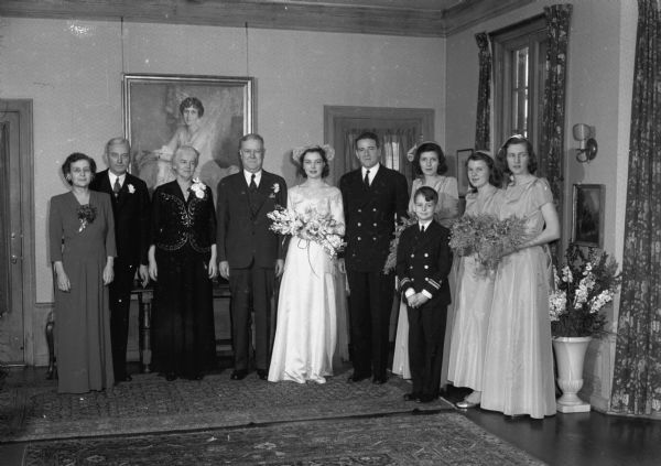 Catherine Coleman and Lt. Gifford P. Foley wedding party, including the couple's parents, Mr. and Mrs. Thomas E. Coleman, Maple Bluff, and Mr. and Mrs. John Foley, Wayne, Pennsylvania; matron of honor, Mrs. Thomas Head Coleman, Boston, Mass.; bridesmaids Helen Resor, Washington, D.C.; and Elizabeth Gundersen, La Crosse; and ring bearer Reed Coleman. The ceremony was held at St. Paul's University Chapel.