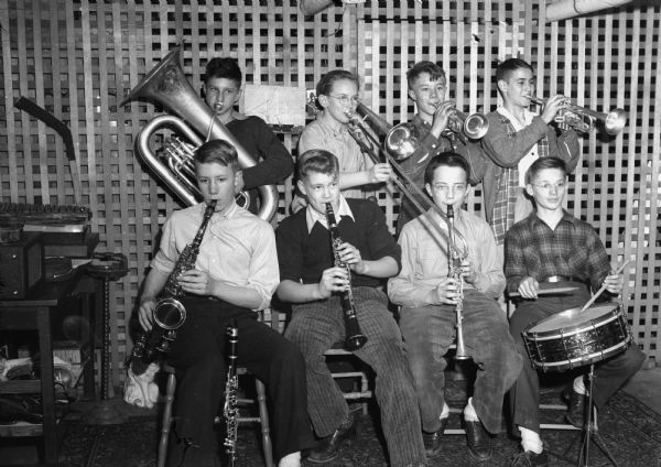 Snazzy Chazzy and his Grenadiers, eigth grade students at Nakoma School, who play some real Milwaukee-style German tempo.
Left to right, front row: Bruce Wencel, Michael Torphy, Bob Consigny and Bob Gesteland. Back row, Bob Roh, Charles "Chaz" Grelle, John Drives and John White.