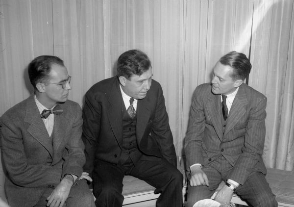 Wendell Willkie interviewed by Rex Karney (left), "Wisconsin State Journal" political reporter, and Marquis Childs (right), whose nationally-syndicated column appears in the <i>Wisconsin State Journal.</i>