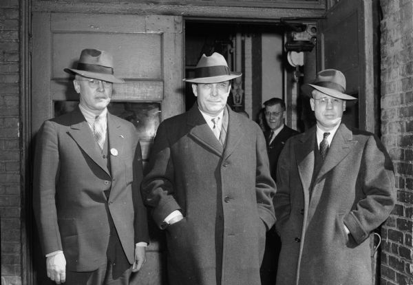 Wendell Willkie with two men by the name of Johnson, possibly George H. Johnson and Herbert Fisk Johnson, Sr.