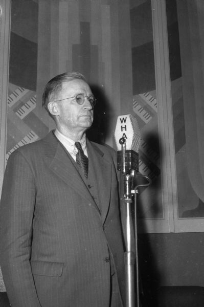 Mr. Witte, possibly Edwin E. Witte, at a WHA microphone.
