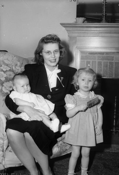 Woman with two children, possibly the Schutz family.