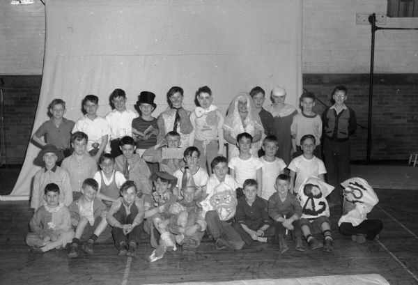 Group portrait of children participating in a YMCA circus.