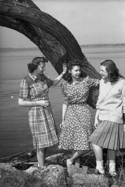Three sorority girls attending the Alpha Phi Sorority garden party on the University of Wisconsin campus.