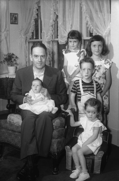 John C. Makin, Route 4, and his five children. Seated in his lap is the youngest, Kathleen Ann. Seated behind her father is Mollie Jane; to his left is Sarah Lee. Standing are Rosetta and John.