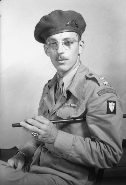 Portrait of Lieutenant W. James Atkins, son of Mrs. Margaret M. Atkins, served with the British Eighth army of the American Field Service in the Middle East and Italy.