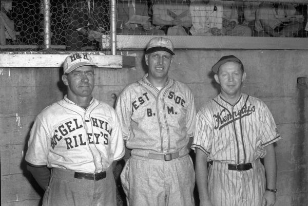 Leo Peterson, Kennedy Dairy manager, Irv Jacobson, West Side Businessmen, and Forrest Henderson, from Riley, Wisconsin, were the coaches for the Madison area amateur baseball all-stars when they played a game against the Navy's Great Lakes Bluejackets.
