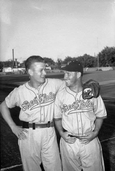 Mizell "Whitey" Platt, left, and Walter Millies, right, who were members of the Madison Blues, in the Three-I League, later part of the Great Lakes Bluejackets. They were in town to play against the Madison-area amateur baseball all-stars.  Platt led Three-I league hitters in 1942; Millies was the Blues' playing manager.