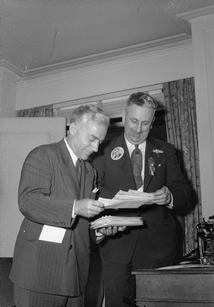 National Democratic political convention in Chicago. Representative Howard McMurray, Milwaukee, candidate for United States Senator, and Thomas R. King, Oconomowoc, sorting mail.