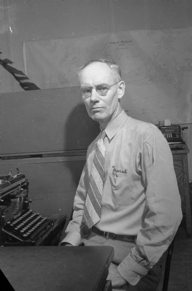Marshall F. Browne at his typewriter. He was editor and publisher of the "East Side News" and several other publications.