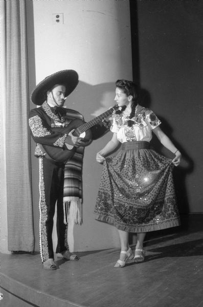 Left to right, Armando Huacuja and Berta Montemayor Koch, natives of Mexico, dance at the annual Latin-American Festival held at the Wisconsin Memorial Union, University of Wisconsin-Madison.