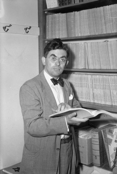 Portrait of H.H. Gerth, assistant professor of sociology at the University of Wisconsin. Gerth was born and grew up in Kassel, Germany, and escaped about seven years prior to this date when he wrote an editorial for the <I>Wisconsin State Journal</I>. He instructed army enlisted men and officers on Nazi propaganda methods after arriving in this country.