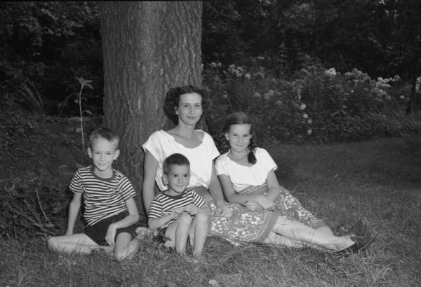 Sally (Mrs. John) Marshall with her children, Jan, Laird, and Owen. They were visiting with her parents, Professor and Mrs. Ray Sprague Owen.