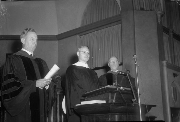 Rev. Schuyler E. Garth, at left, newly inagurated Methodist Bishop of Wisconsin area, being welcomed by Rev. J. Pierce Newell, Supt. of the Southern District, and Bishop Ralph Cushman, Bishop of St. Paul area.