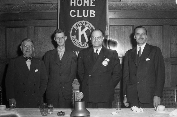 Kiwanis Club honors city newspapers for their wartime service. Left to right: William T. Evjue, editor of the <i>Capital Times</i>; Edward Doane, Govenor Goodland's secretary; Wilbur Grant, president of Madison Kiwanis Club; and Don Anderson, publisher of the <i>Wisconsin State Journal</i>.