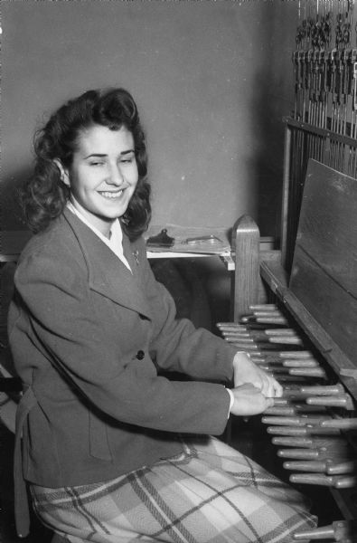 Elsie Taschek at the keyboard of the University of Wisconsin-Madison carillon. Traditionally the carillon was always played by men before World War II.